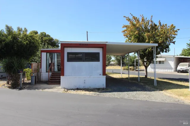 a view of a house with a porch