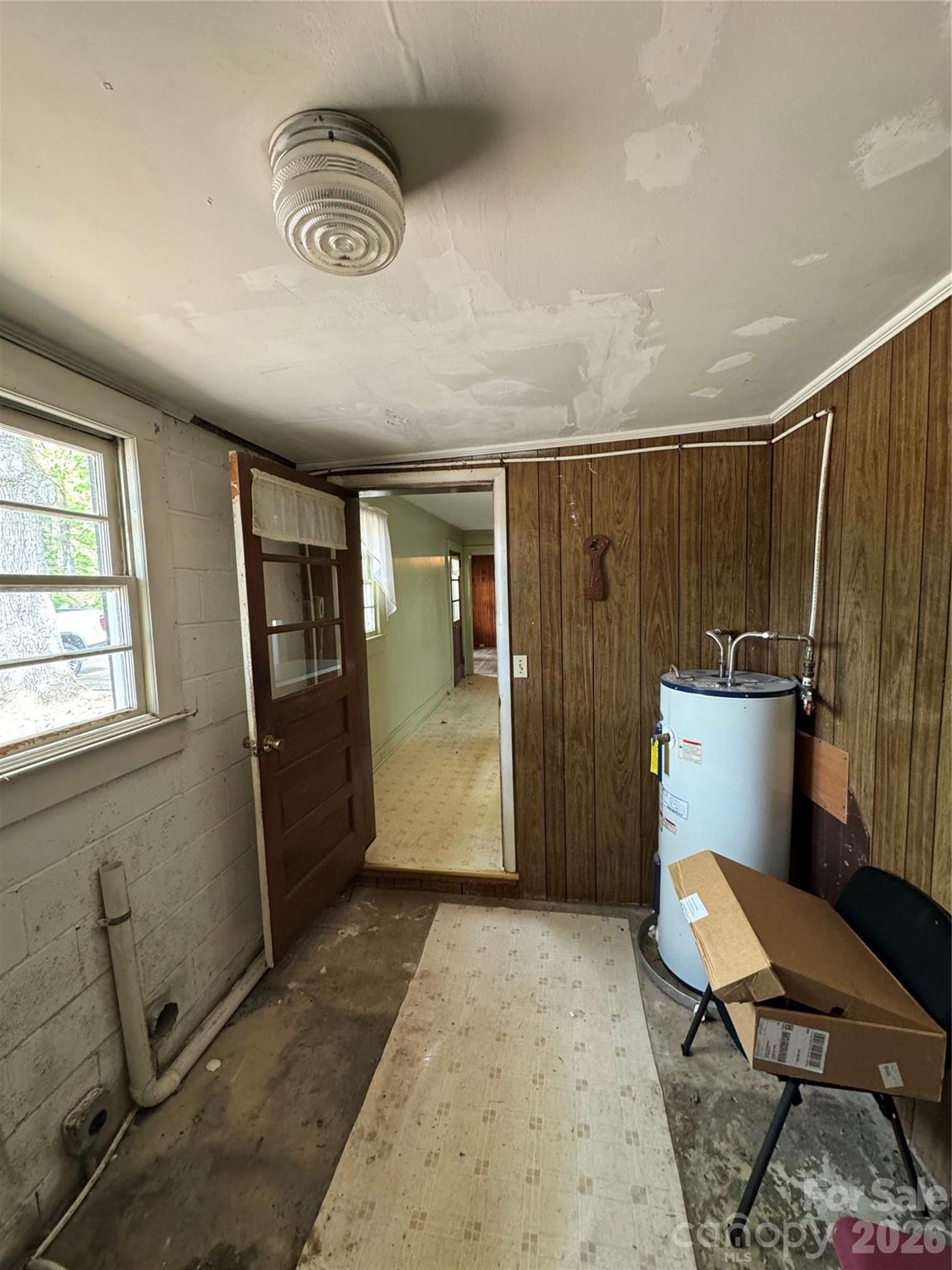 509 East Main Street Locust, NC 28097 - Photo 13 of 40 a bathroom with a sink a toilet a mirror and shower