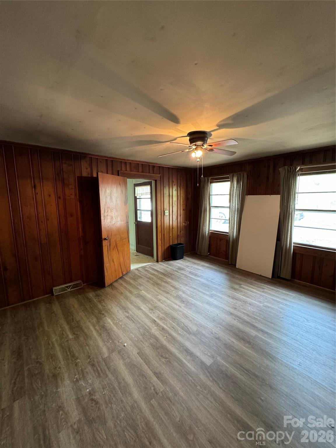 509 East Main Street Locust, NC 28097 - Photo 16 of 40 an empty room with windows and closet