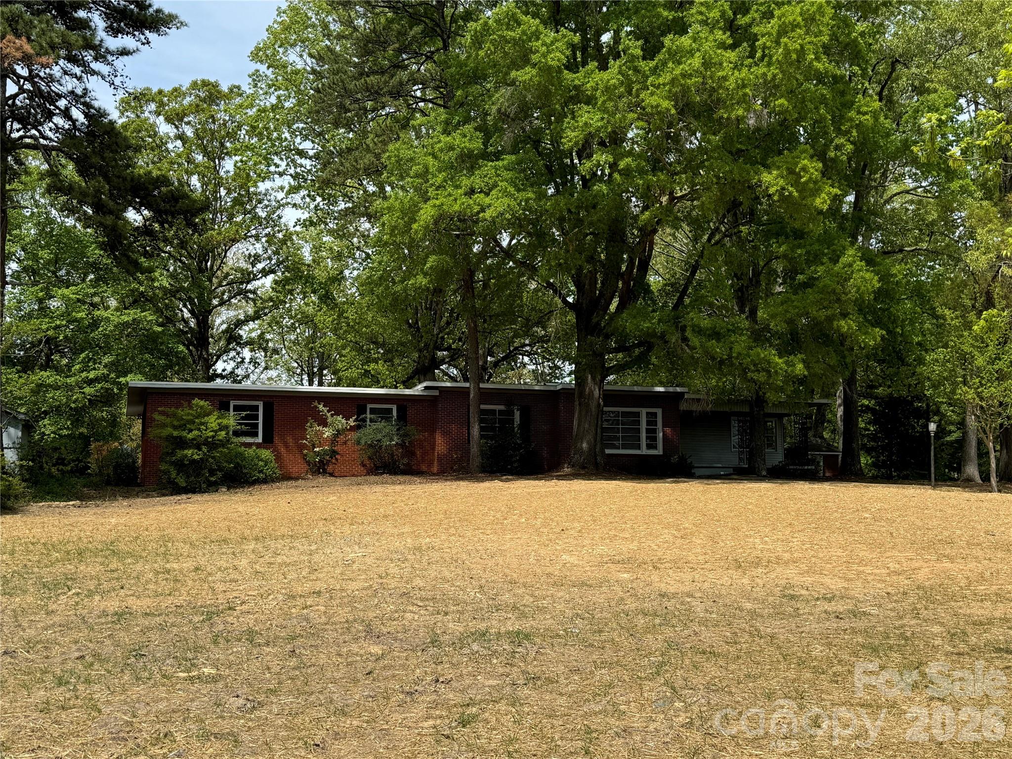 509 East Main Street Locust, NC 28097 - Photo 3 of 40 a swimming pool with an outdoor space