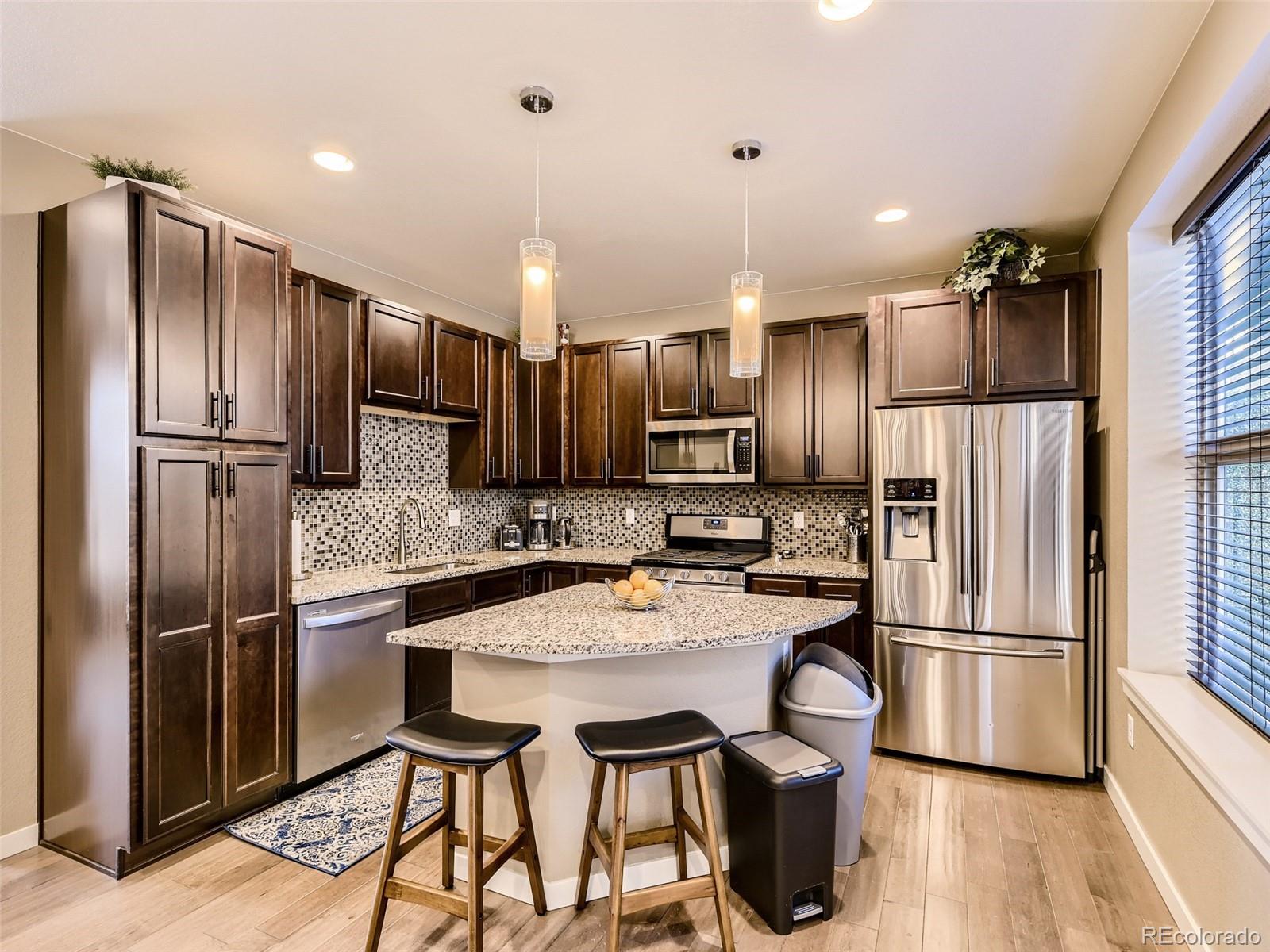 10068 Town Ridge Lane Lone Tree, CO 80124 - Photo 7 of 37