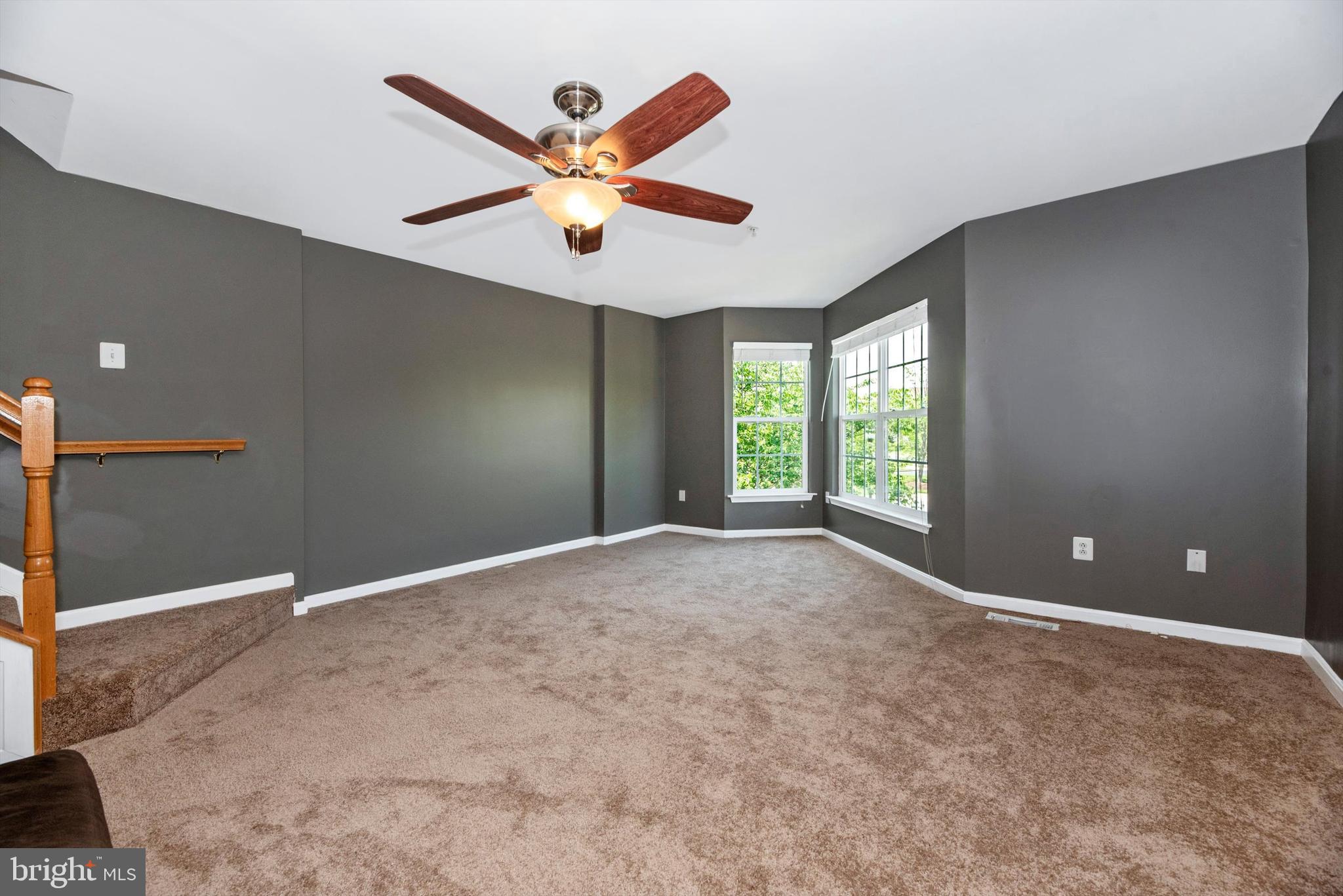 605 Tivoli Road Frederick, MD 21703 - Photo 13 of 35 a view of a livingroom with a ceiling fan and window