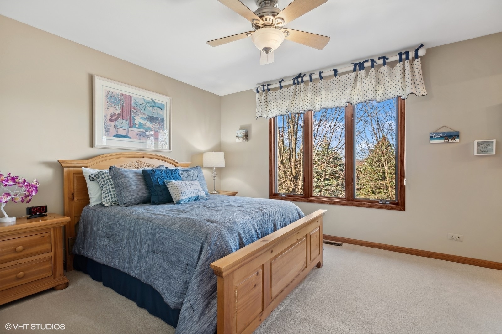 321 Ridge Lane Lake In The Hills, IL 60156 - Photo 23 of 46 a spacious bedroom with a bed and a chandelier