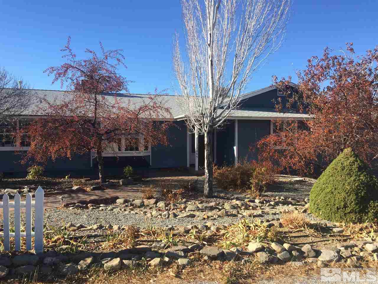 12845 Fellowship Way Reno, NV 89511 - Photo 1 of 1 a front view of a house with garden