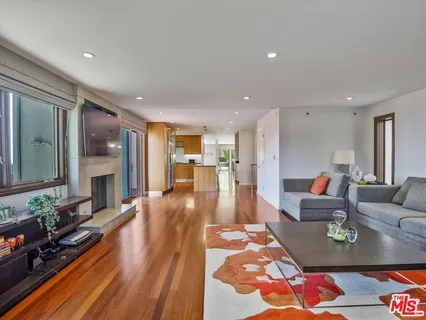 a living room with furniture and a table