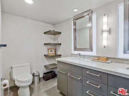a bathroom with a sink and a toilet