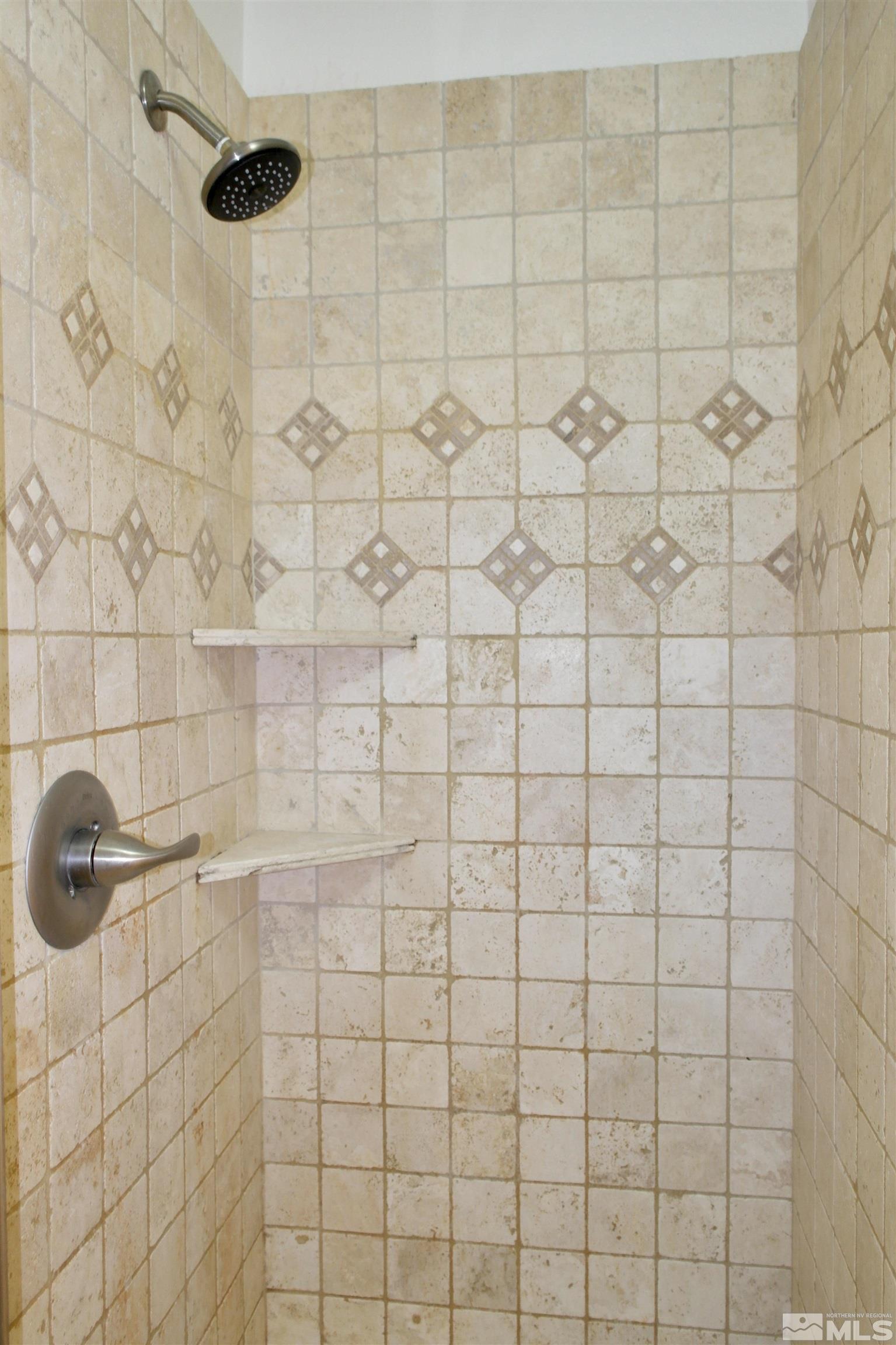 1187 Wagon Wheel Circle Reno, NV 89503 - Photo 16 of 29 a bathroom with a shower