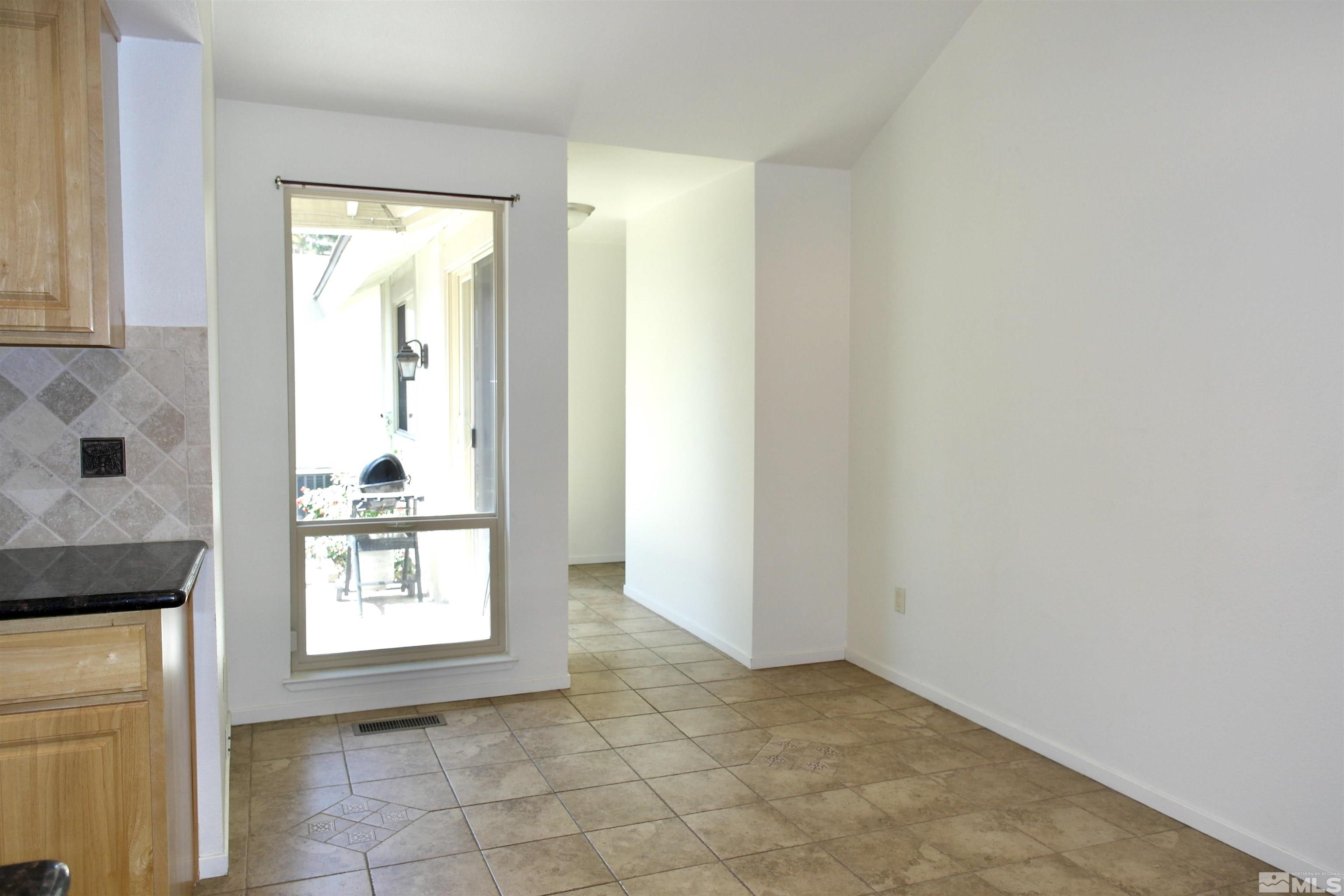1187 Wagon Wheel Circle Reno, NV 89503 - Photo 8 of 29 a view of an empty room and window
