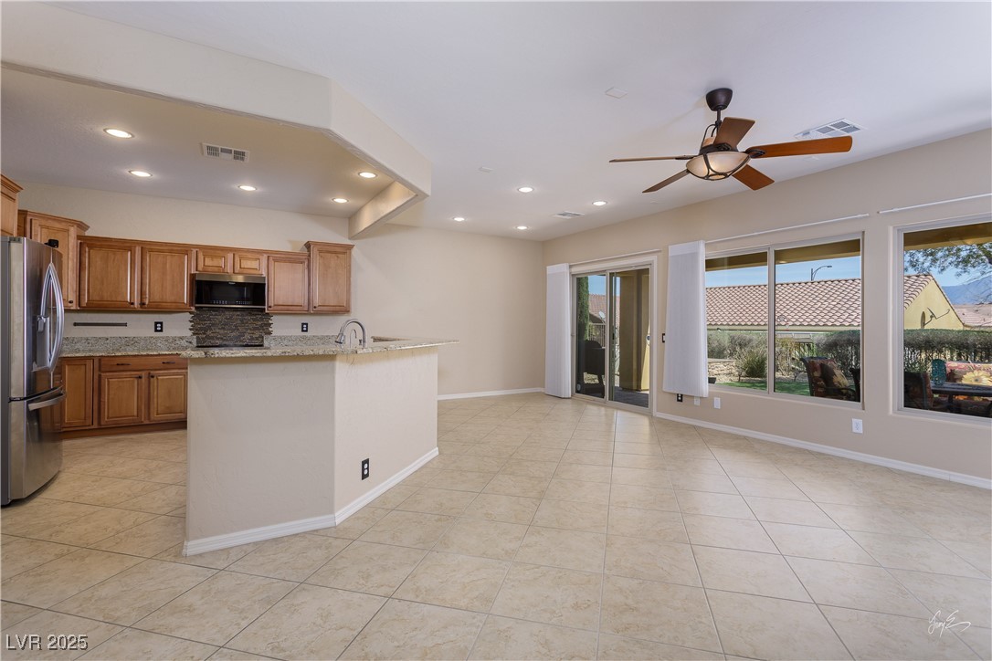 1074 Wagon Trail Mesquite, NV 89034 - Photo 7 of 27 Kitchen with visible vents, a ceiling fan, recessed lighting, and stainless steel appliances