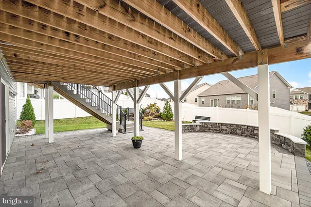 a view of a house with a yard and plants