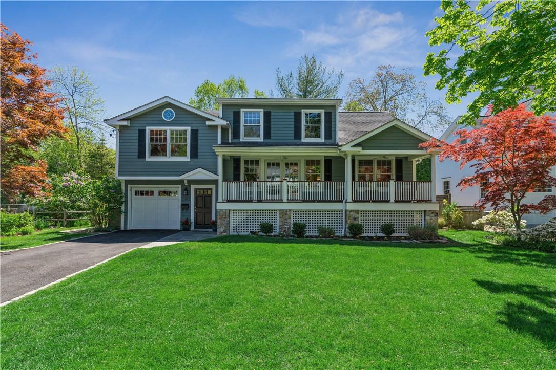 19 Chamberlain Street Rye, NY 10580 - Photo 1 of 1 a front view of house with yard and green space