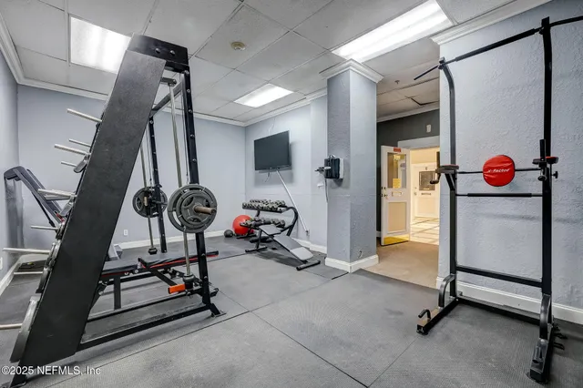 a view of a room with gym equipment