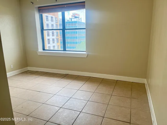 an empty room with windows