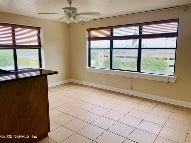 an empty room with windows