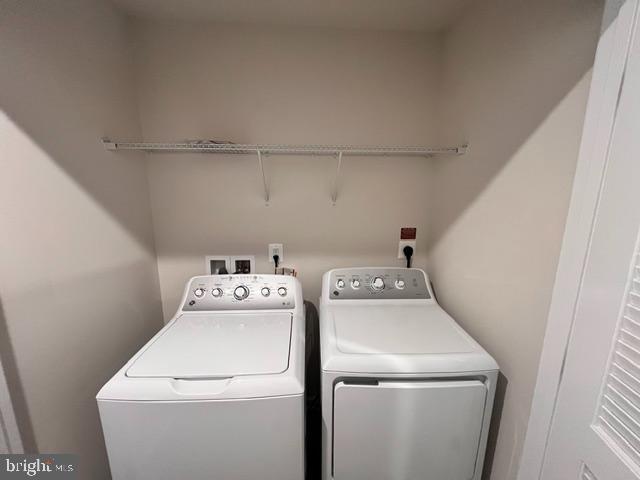 7236 Potomac Terrace Ruther Glen, VA 22546 - Photo 11 of 24 a utility room with dryer and washer