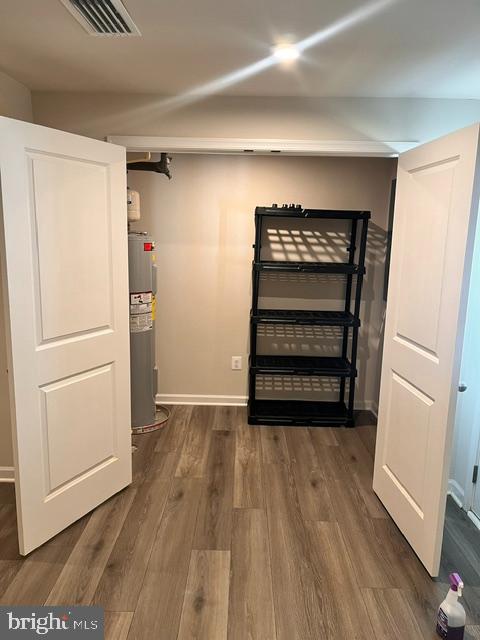 7236 Potomac Terrace Ruther Glen, VA 22546 - Photo 2 of 24 a view of walk in closet with empty racks