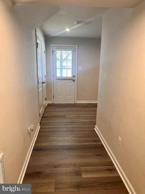 7236 Potomac Terrace Ruther Glen, VA 22546 - Photo 3 of 24 a view of a hallway with wooden floor and staircase