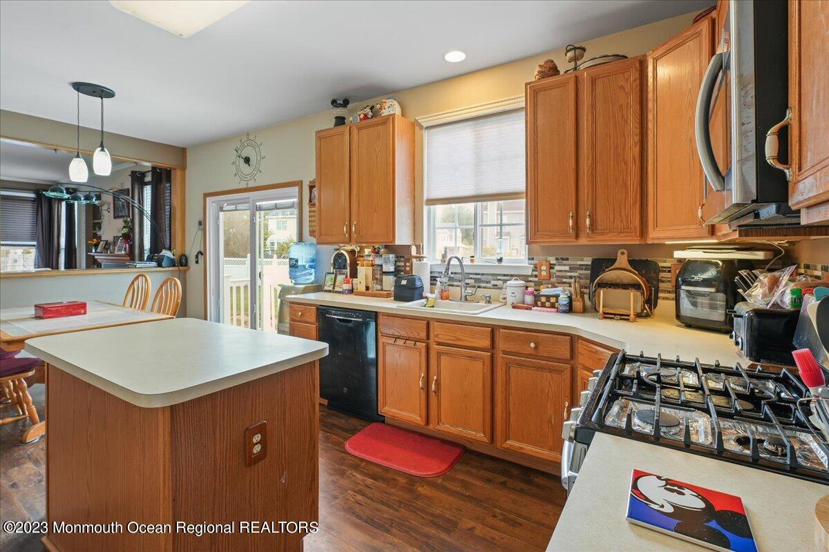 1 Chiswick Drive Jackson, NJ 08527 - Photo 10 of 48 a kitchen with stainless steel appliances a sink a stove a refrigerator and cabinets