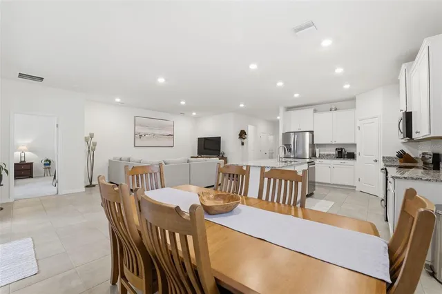a view of a dining room with furniture