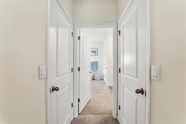a bathroom with a glass door shower