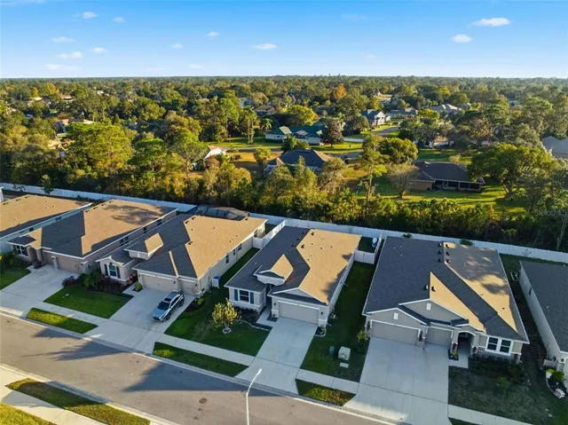 an aerial view of a house with a outdoor space