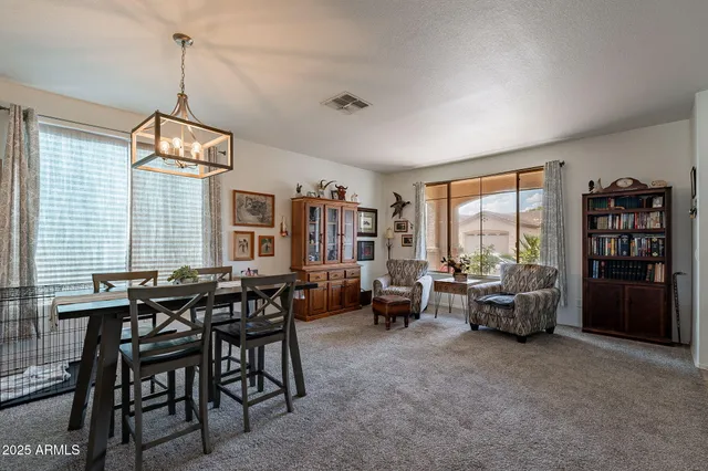 a view of a livingroom with furniture and window