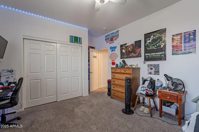 a view of room with workspace and a window