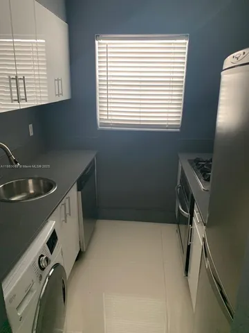 a storage room with washer and dryer