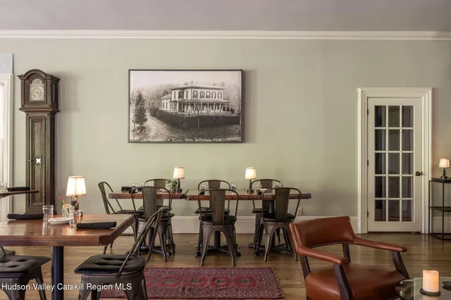 a view of a chairs and table on the terrace