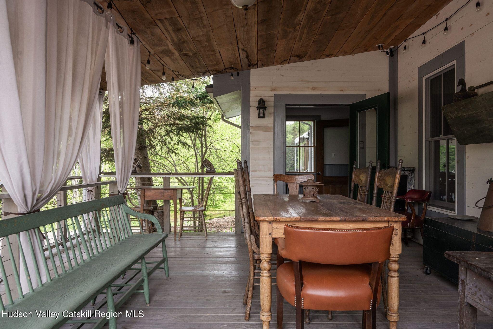 102 Main Street Jefferson, NY 12093 - Photo 21 of 57 a dining room with furniture window and wooden floor