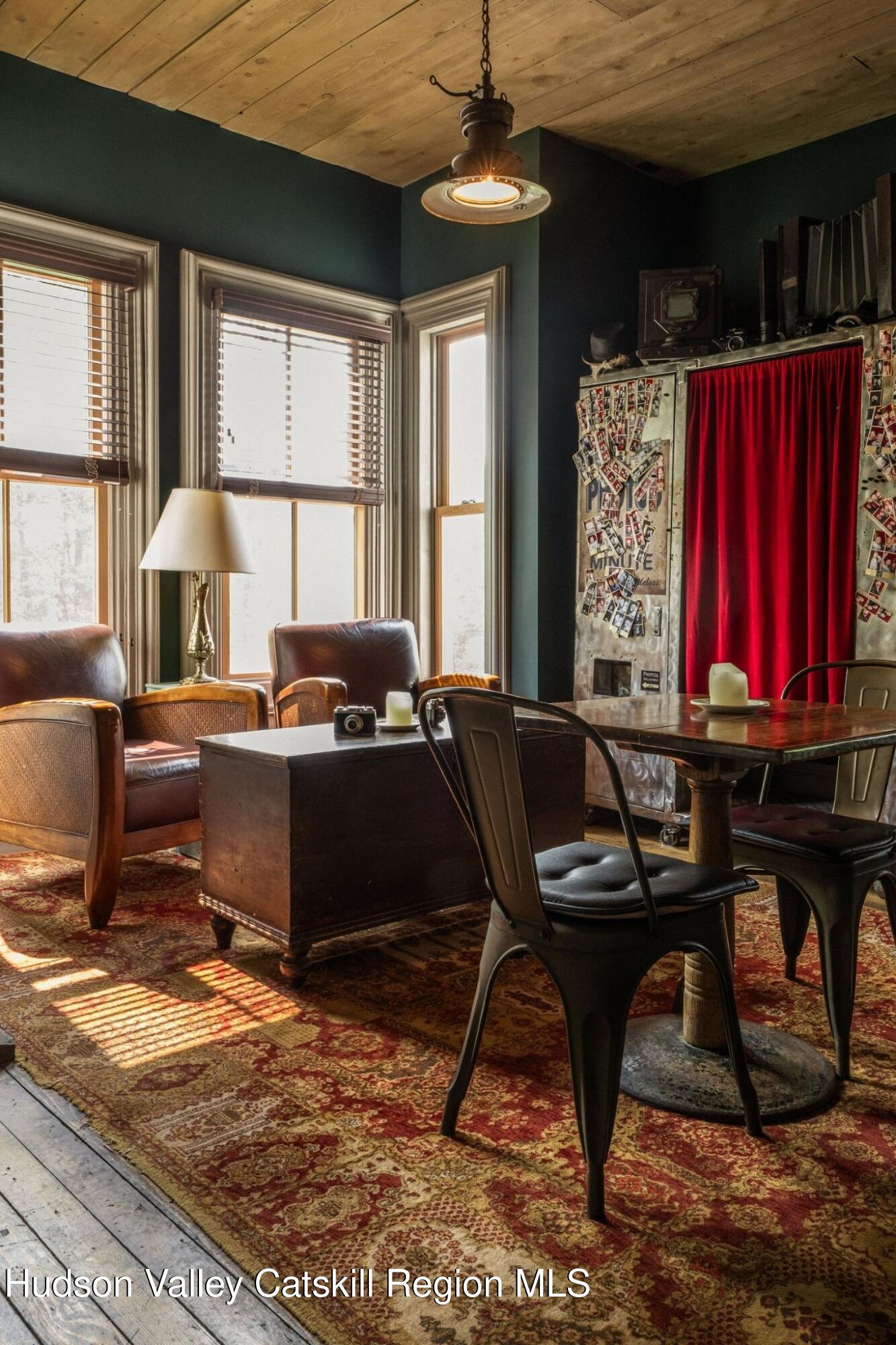 102 Main Street Jefferson, NY 12093 - Photo 25 of 57 a room with furniture a rug and a window