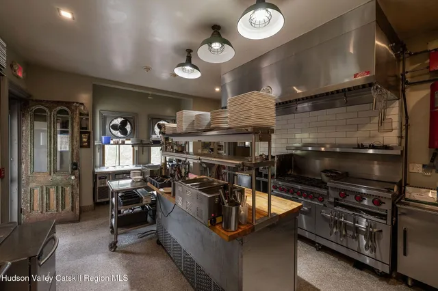 a view of a porch with furniture