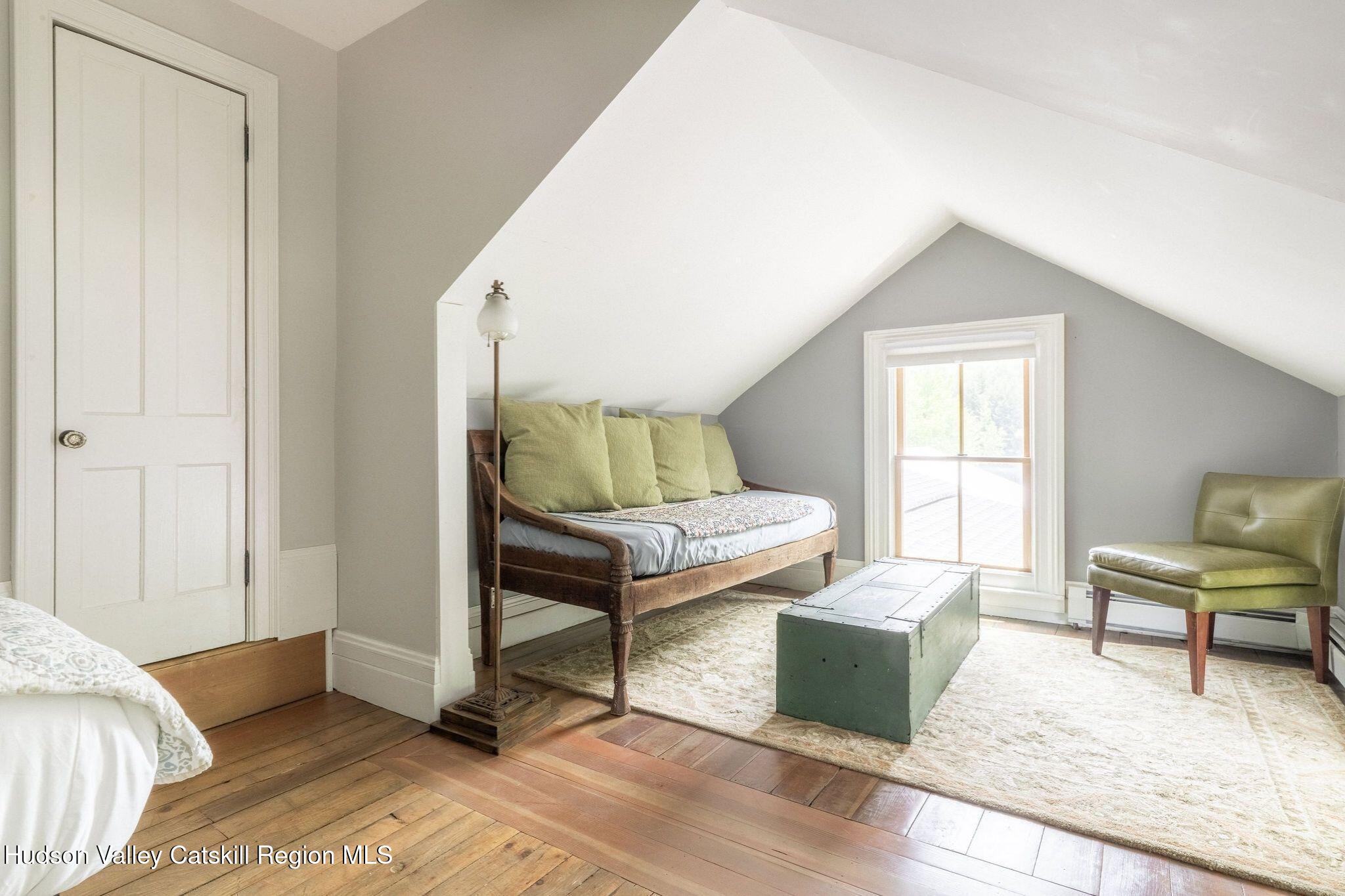 102 Main Street Jefferson, NY 12093 - Photo 39 of 57 a living room with furniture and a window