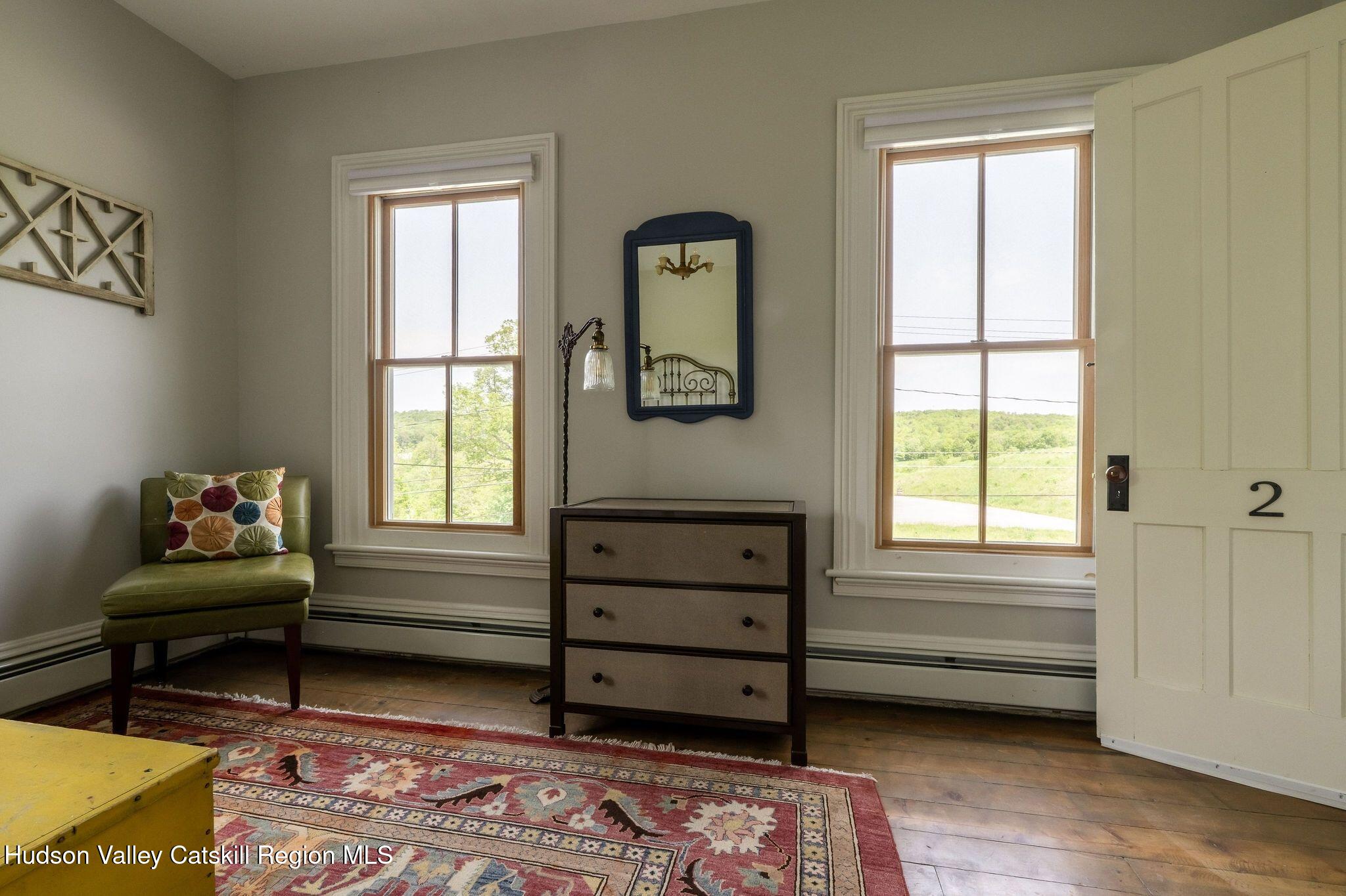 102 Main Street Jefferson, NY 12093 - Photo 41 of 57 a bedroom with a bed and a window