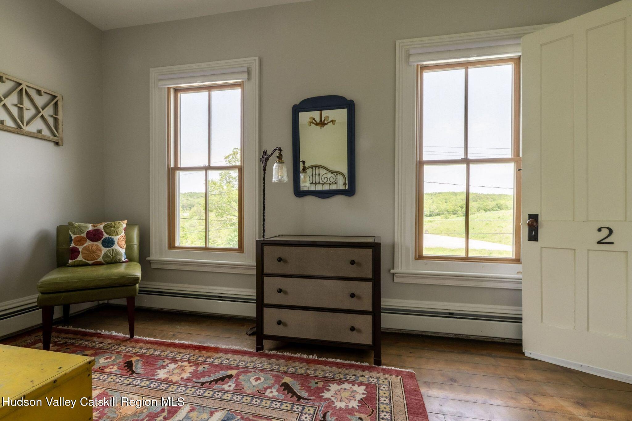 102 Main Street Jefferson, NY 12093 - Photo 47 of 57 a bedroom with a bed and a window