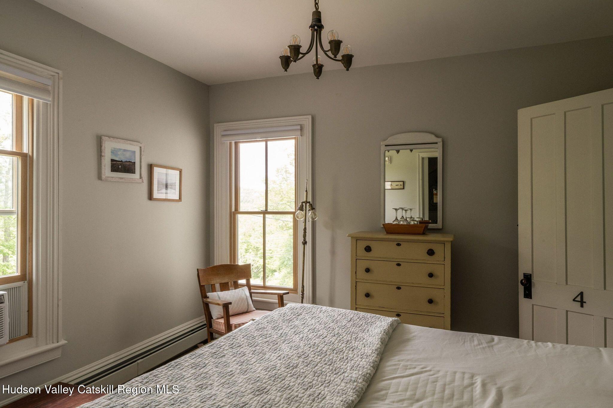 102 Main Street Jefferson, NY 12093 - Photo 51 of 57 a bedroom with a bed and a window