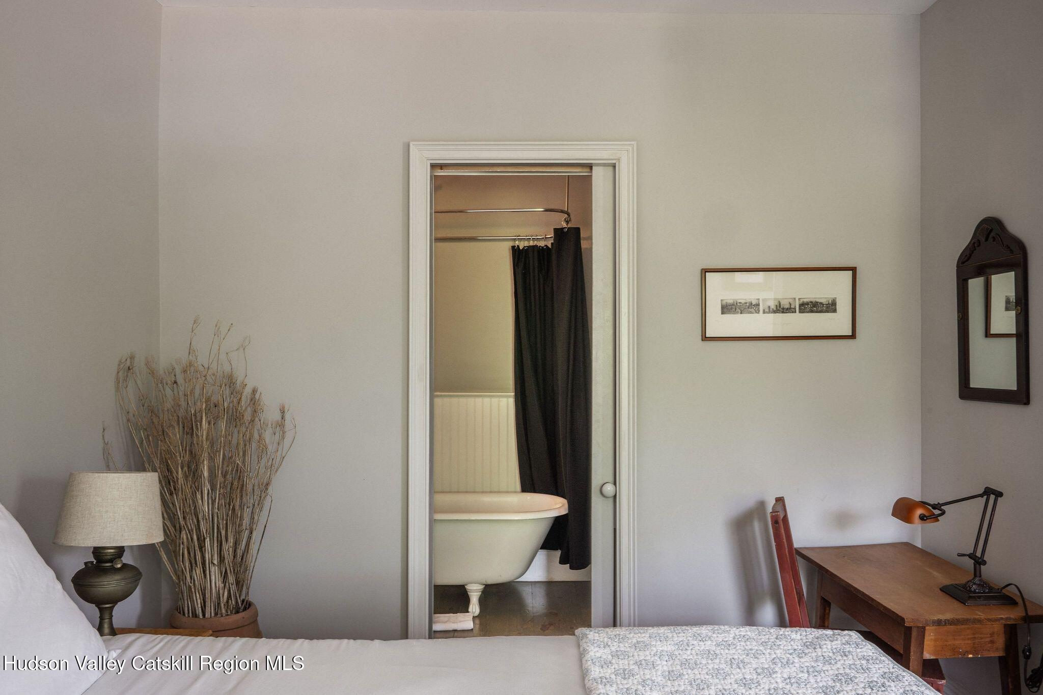102 Main Street Jefferson, NY 12093 - Photo 53 of 57 a living room with furniture and a window