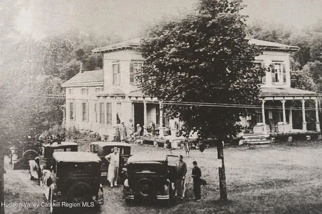 a view of house with outdoor seating space