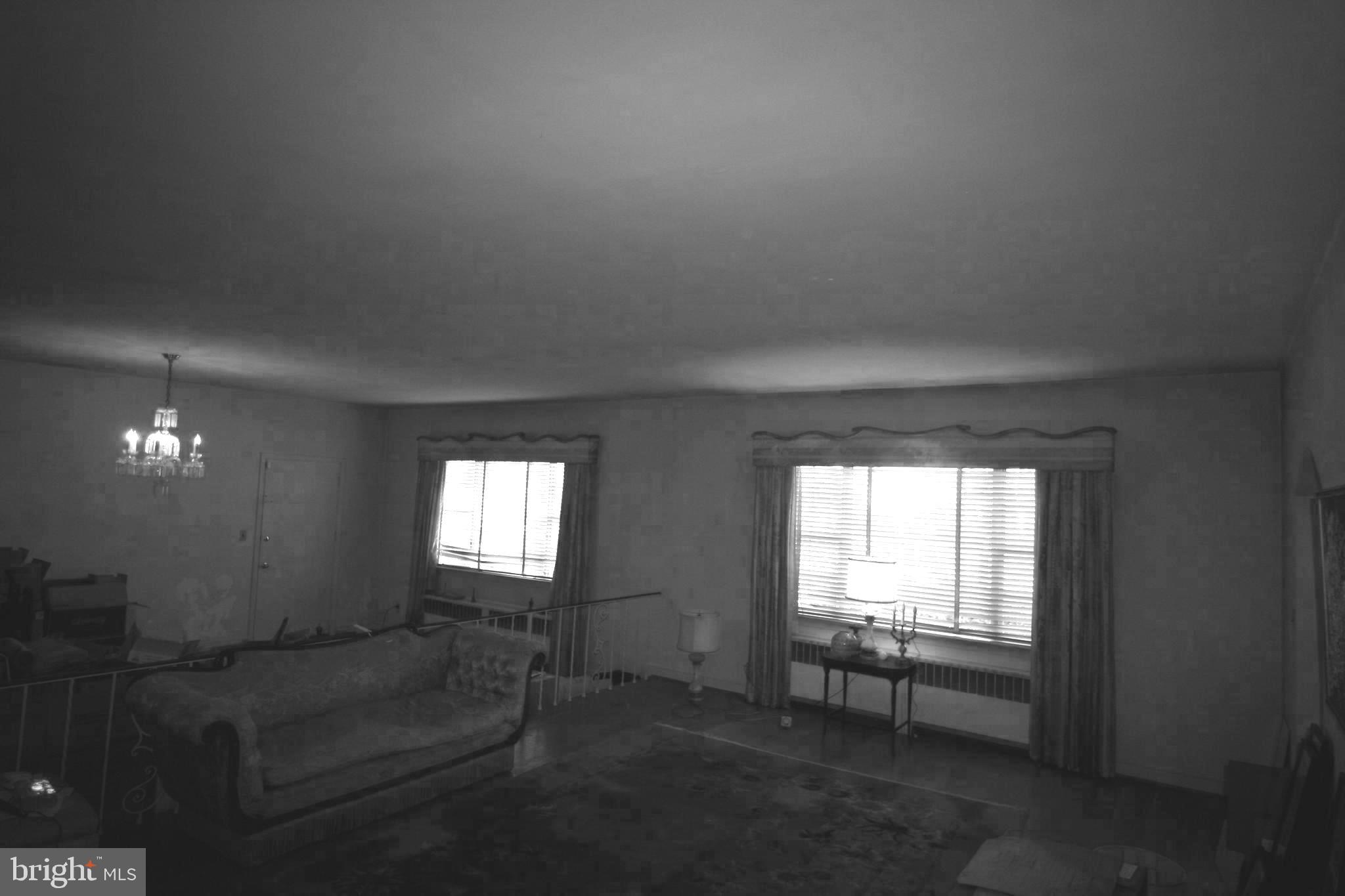 6510 16th Street Northwest Washington, DC 20012 - Photo 13 of 32 a living room with furniture and a window