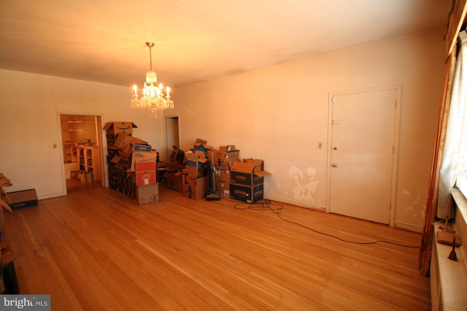 6510 16th Street Northwest Washington, DC 20012 - Photo 14 of 32 wooden floor in an empty room with a window
