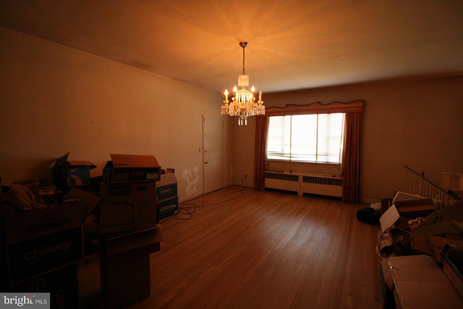 6510 16th Street Northwest Washington, DC 20012 - Photo 15 of 32 a room with hard wood floors and a window