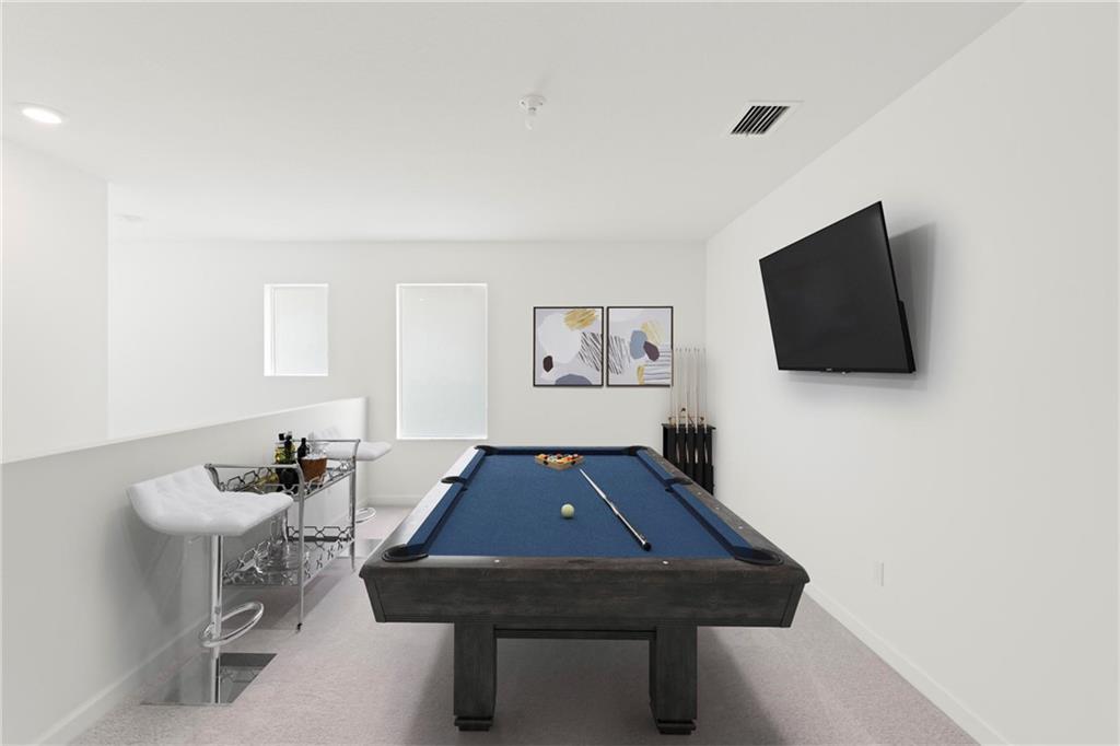 22974 Hillshire Road Boca Raton, FL 33433 - Photo 5 of 24 a room with furniture pool table and flat screen tv