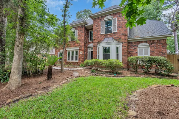 $635,000 | 118 Quiet Oak Circle, The Woodlands, TX 77381