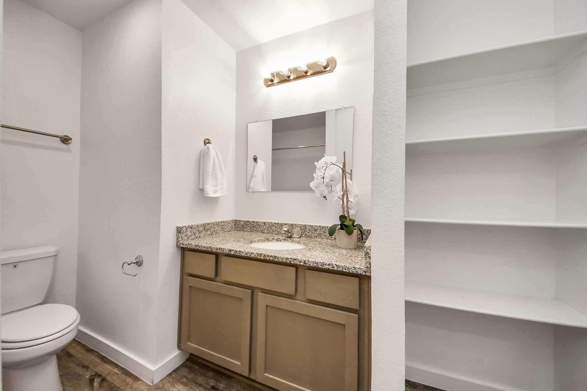 21155 Gosling Road, Unit 40 Spring, TX 77388 - Photo 17 of 33 a bathroom with a granite countertop sink a toilet and a mirror