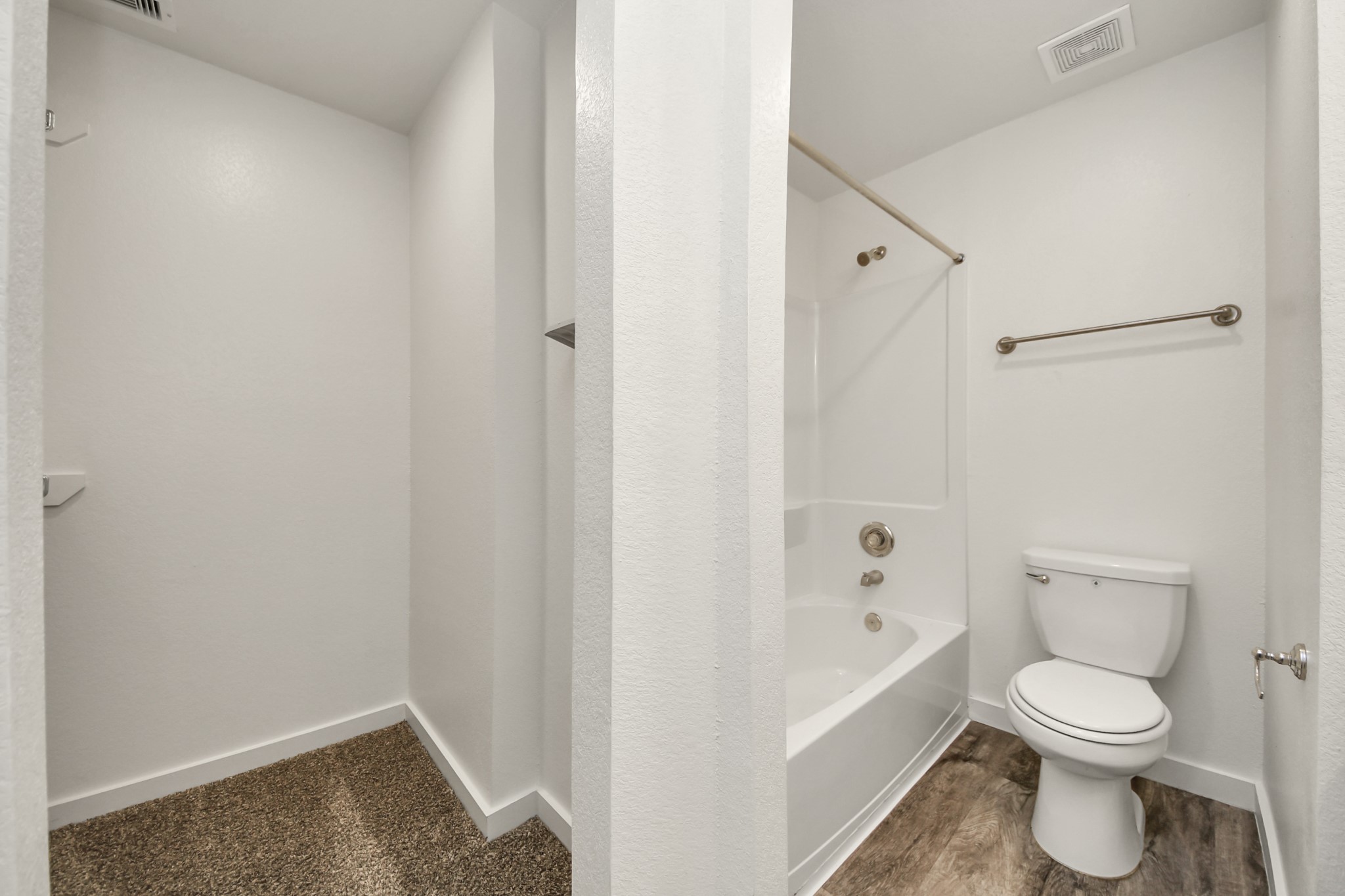 21155 Gosling Road, Unit 40 Spring, TX 77388 - Photo 18 of 33 a white toilet sitting next to a bathtub