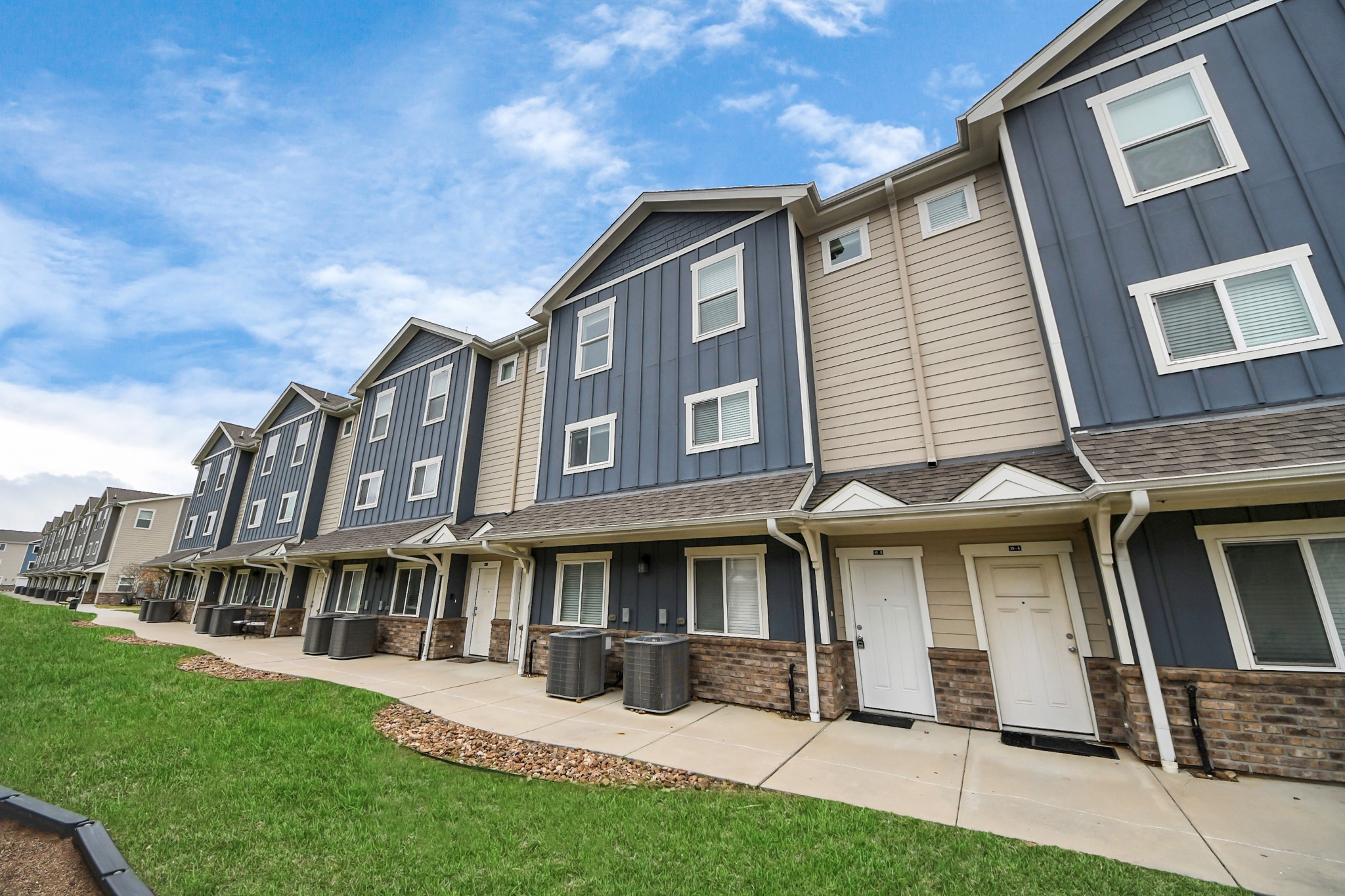 21155 Gosling Road, Unit 40 Spring, TX 77388 - Photo 2 of 33 a view of a building with a yard