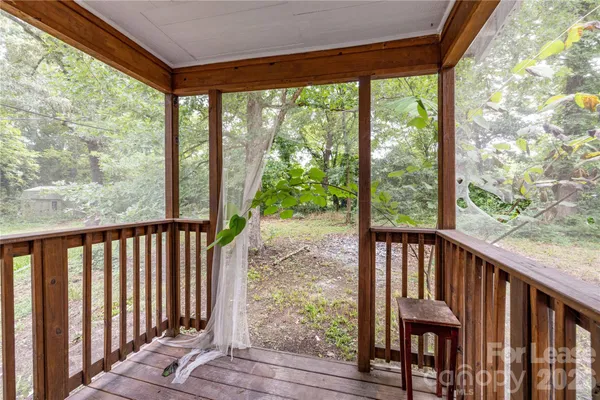 a view of a porch with a yard