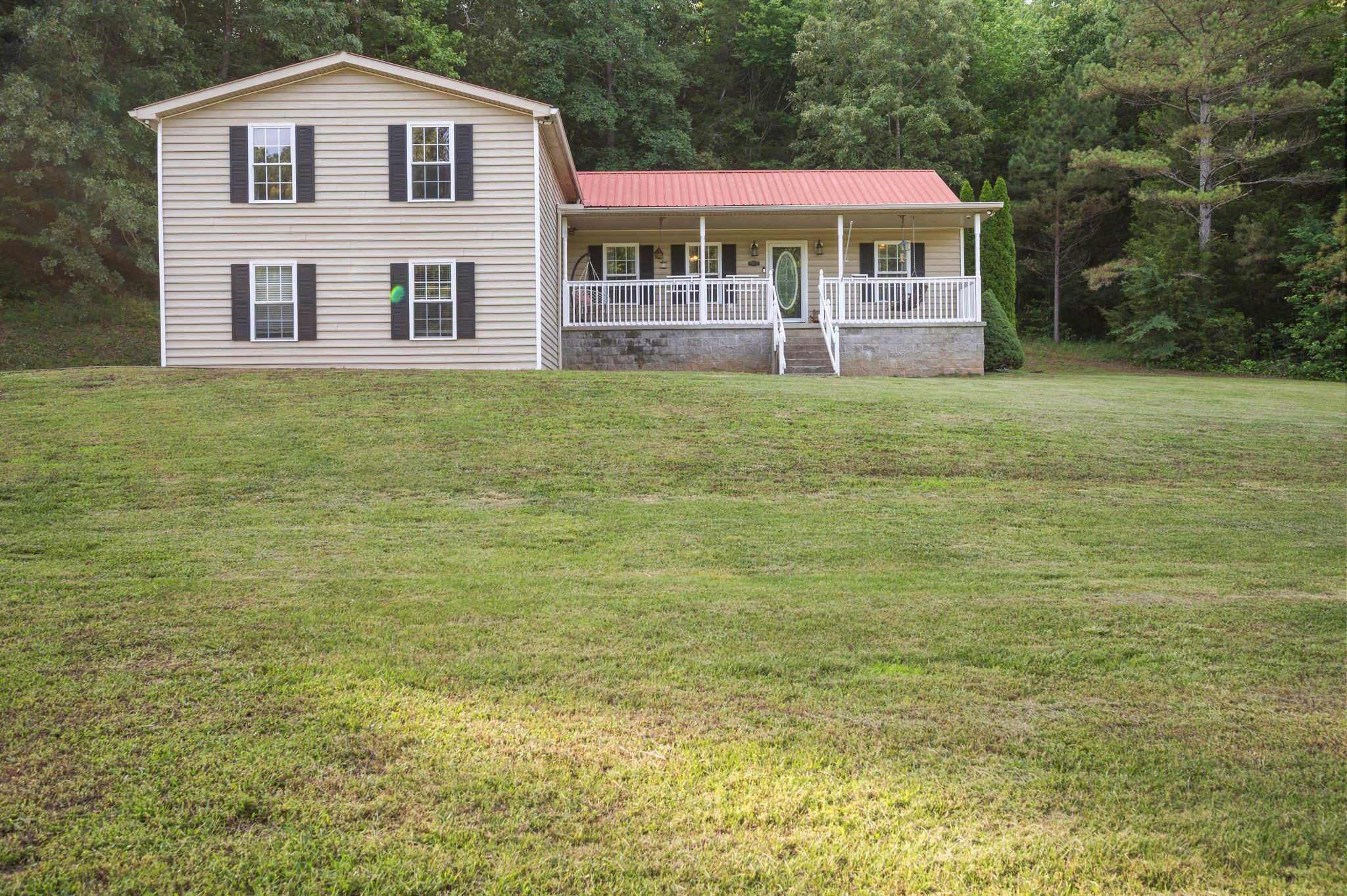 1197 Biter Road Cunningham, TN 37052 - Photo 3 of 38 a front view of a house with a yard
