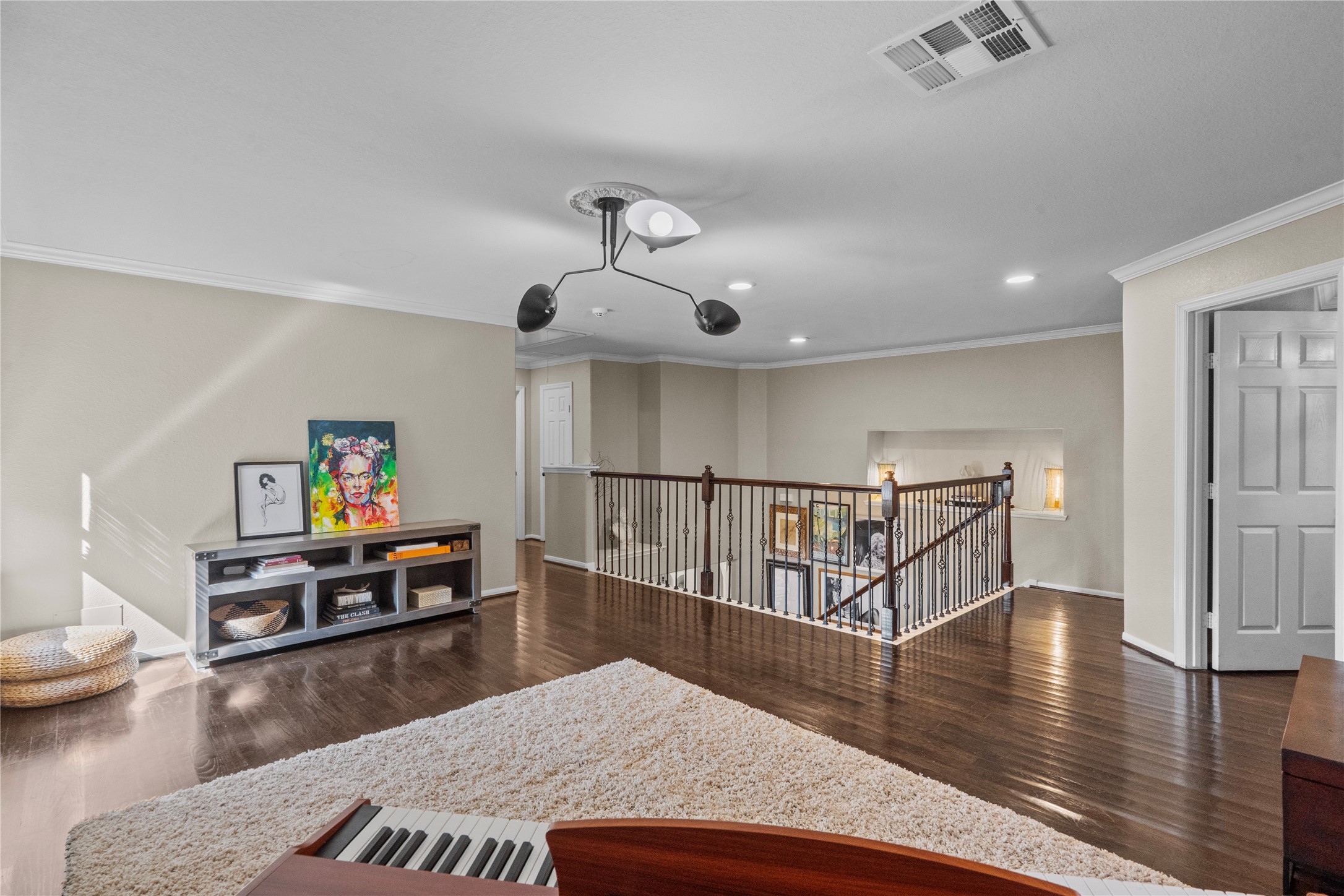 11514 Senna Ledge Court Houston, TX 77089 - Photo 22 of 48 a living room with furniture and a wooden floor