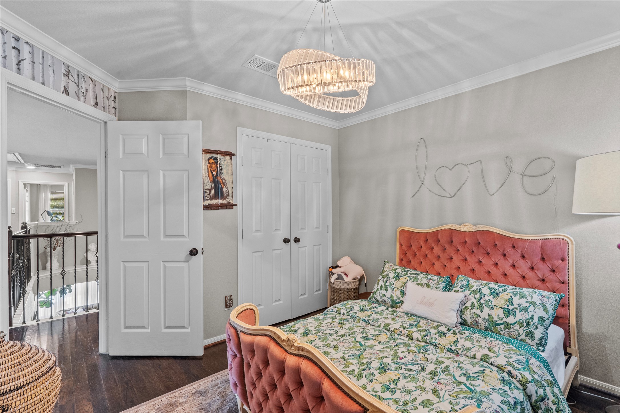 11514 Senna Ledge Court Houston, TX 77089 - Photo 25 of 48 a bedroom with a bed and wooden floor